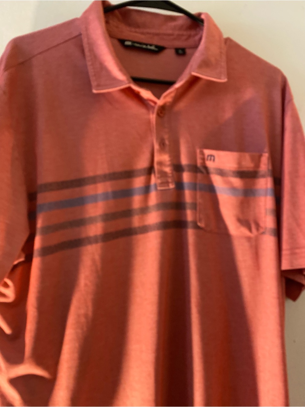 Travis Mathew Coral Polo with Navy and Charcoal Stripes